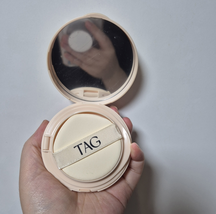 태그 (TAG) 듀이 스킨 쿠션 [SPF50+/PA+++] [2호 누드라이트] review image