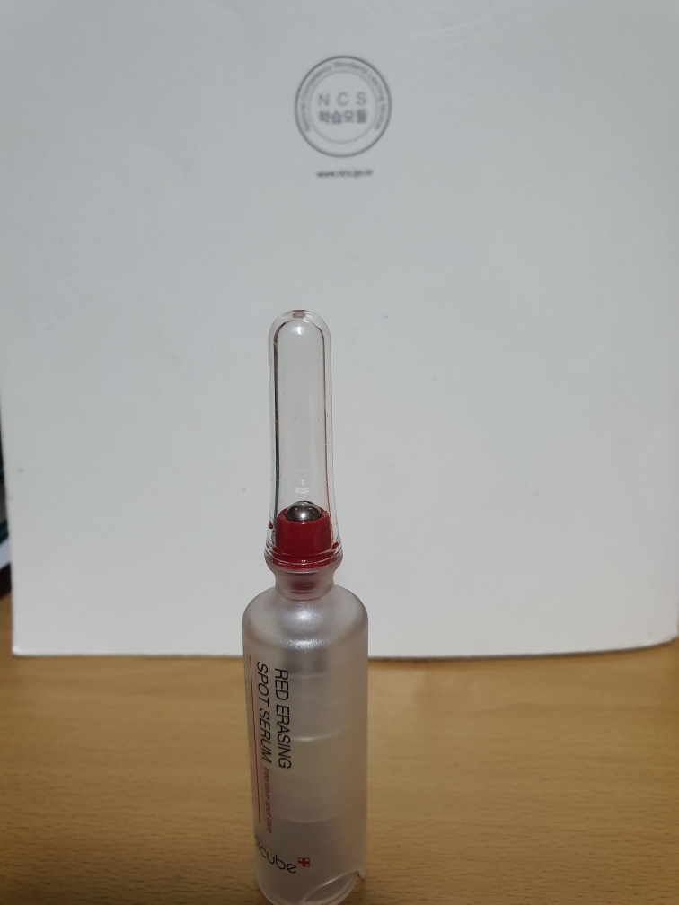 Real user review photo of Red Erasing Spot Serum