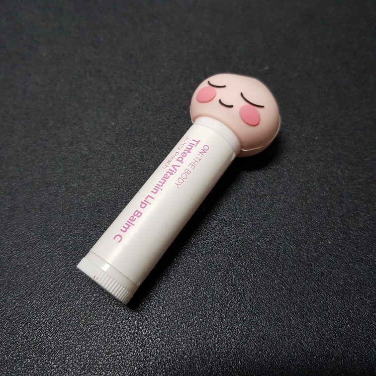 apeach vitamin c lip balm ON:THEBODY Little Friends Collaboration Kakao Little Tinted Reviews including vitamin C and peptides ON:THEBODY Apeach Tinted Lip Balm