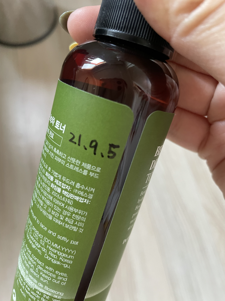 Real user review photo of deep green tea toner