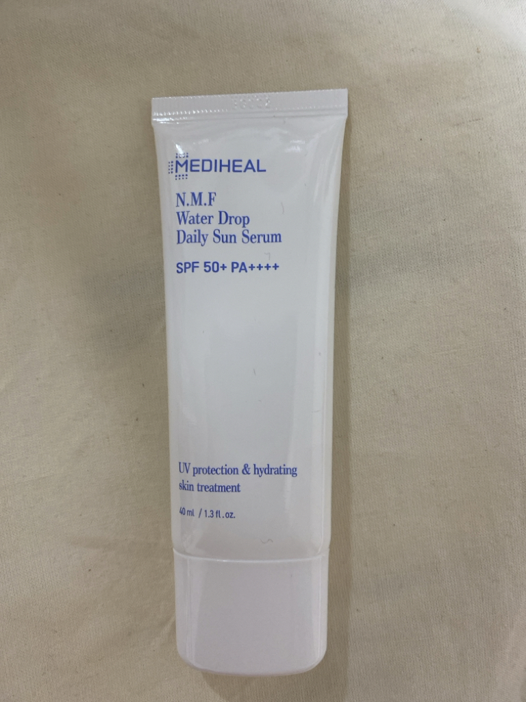 Real user review photo of N.M.F Sun Serum [SPF50+/PA++++]