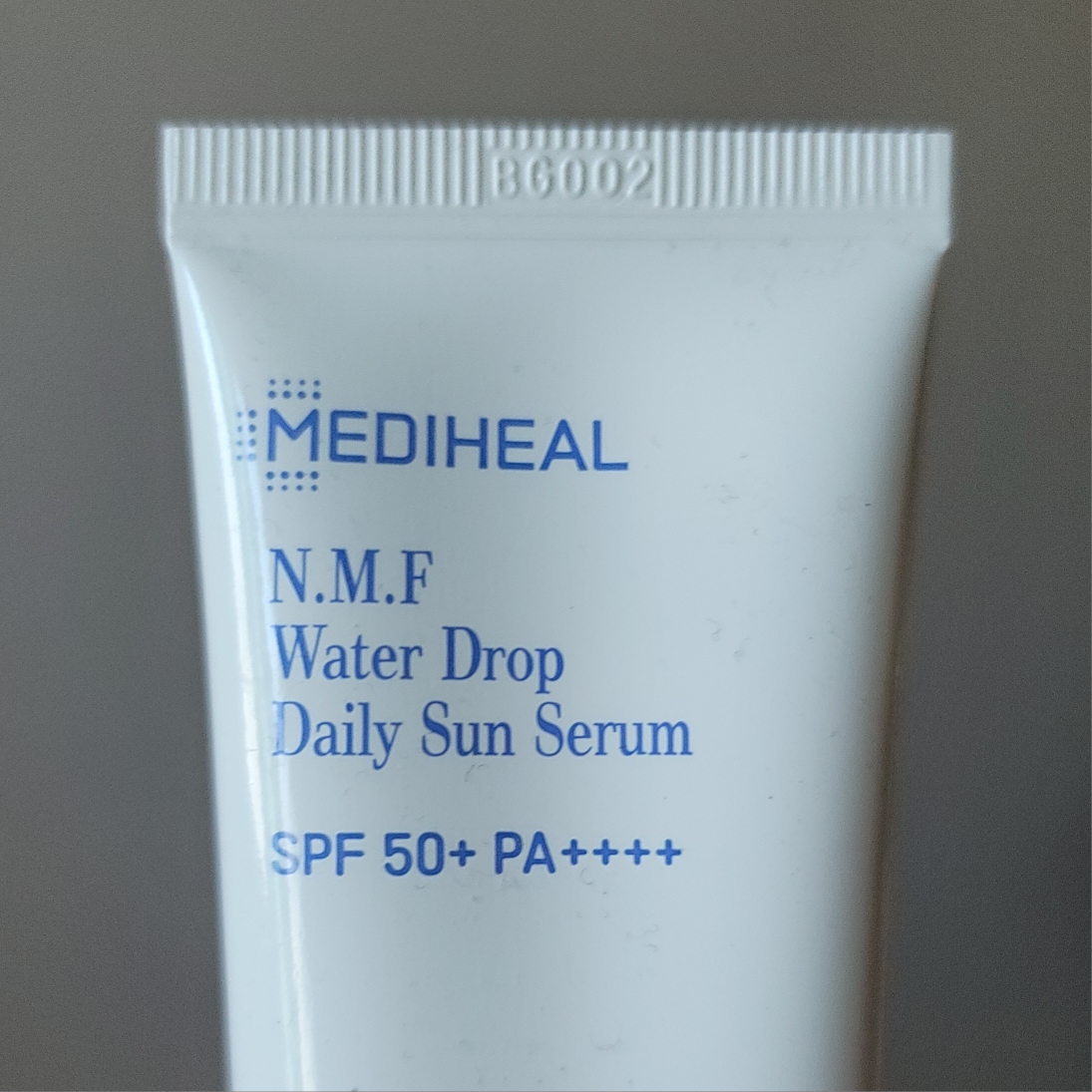Real user review photo of N.M.F Sun Serum [SPF50+/PA++++]