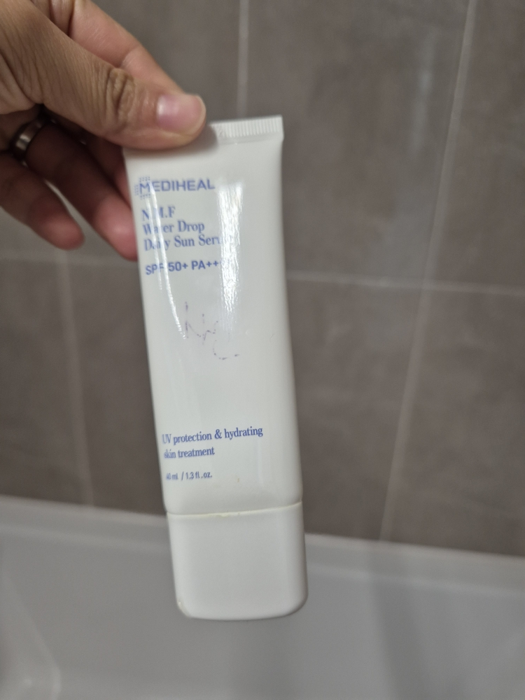 Real user review photo of N.M.F Sun Serum [SPF50+/PA++++]
