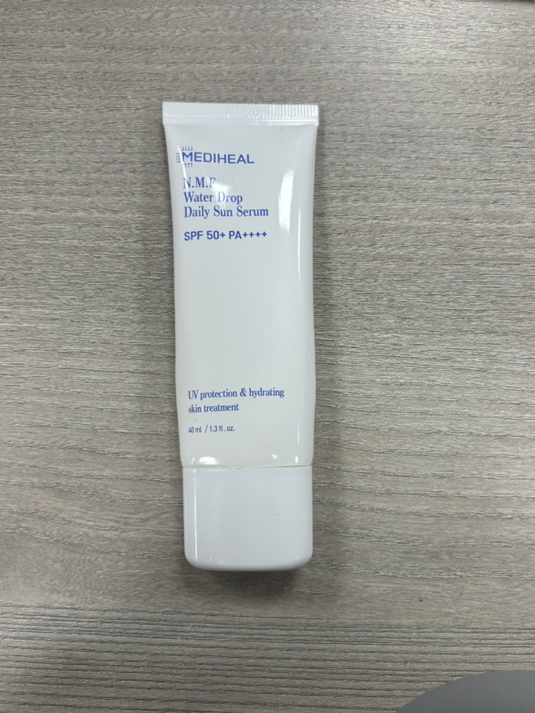 Real user review photo of N.M.F Sun Serum [SPF50+/PA++++]